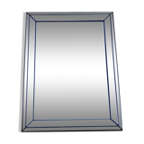 Vintage mirror deknudt with 70's parecloses