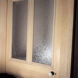 Large glazed door and its old glazed transom.