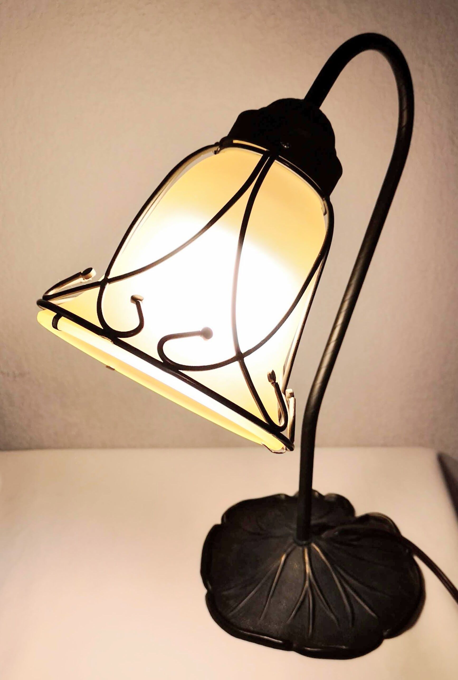 Aged metal and tulip glass