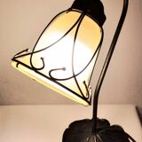 Aged metal and tulip glass