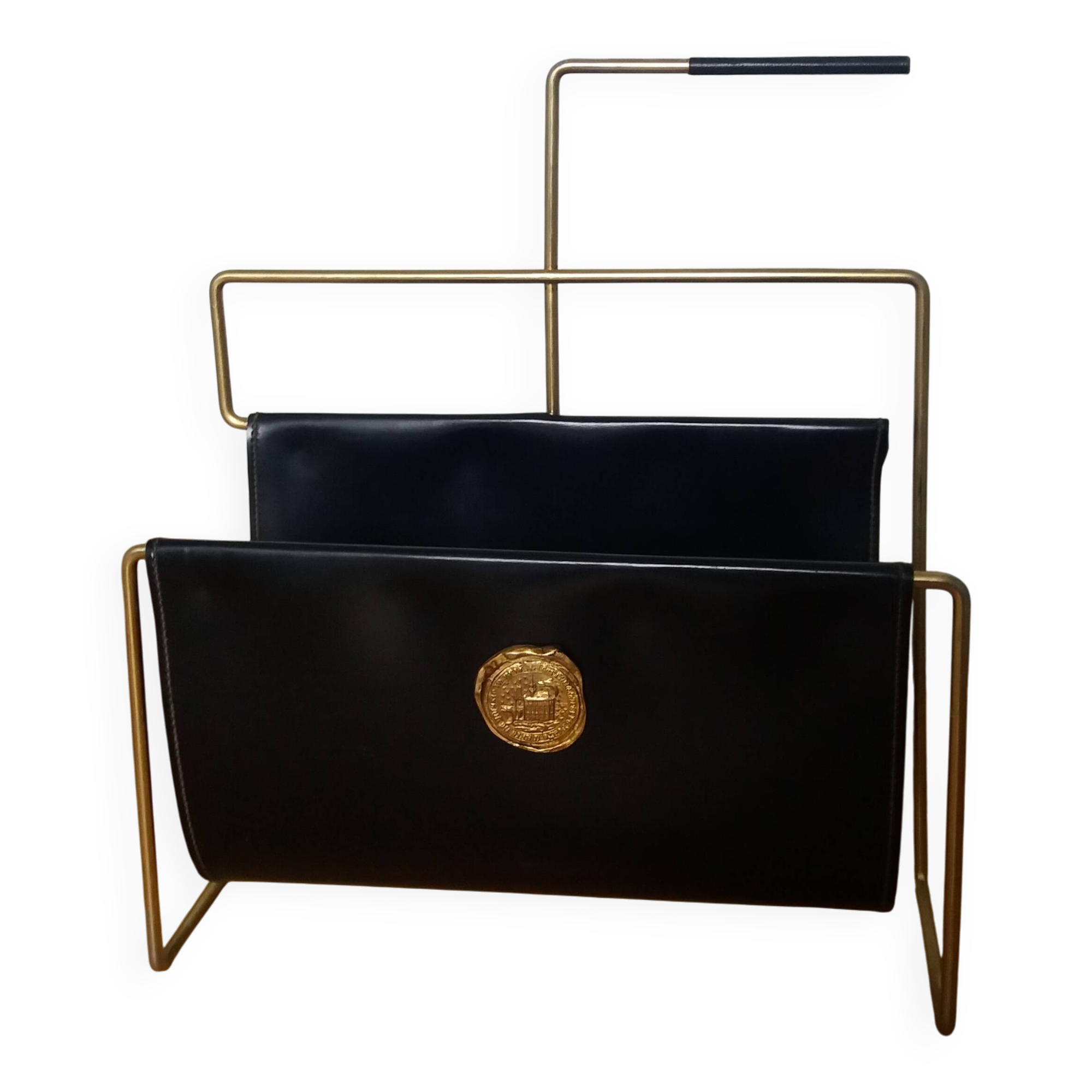 Modernist magazine rack in the style of Jacques Adnet