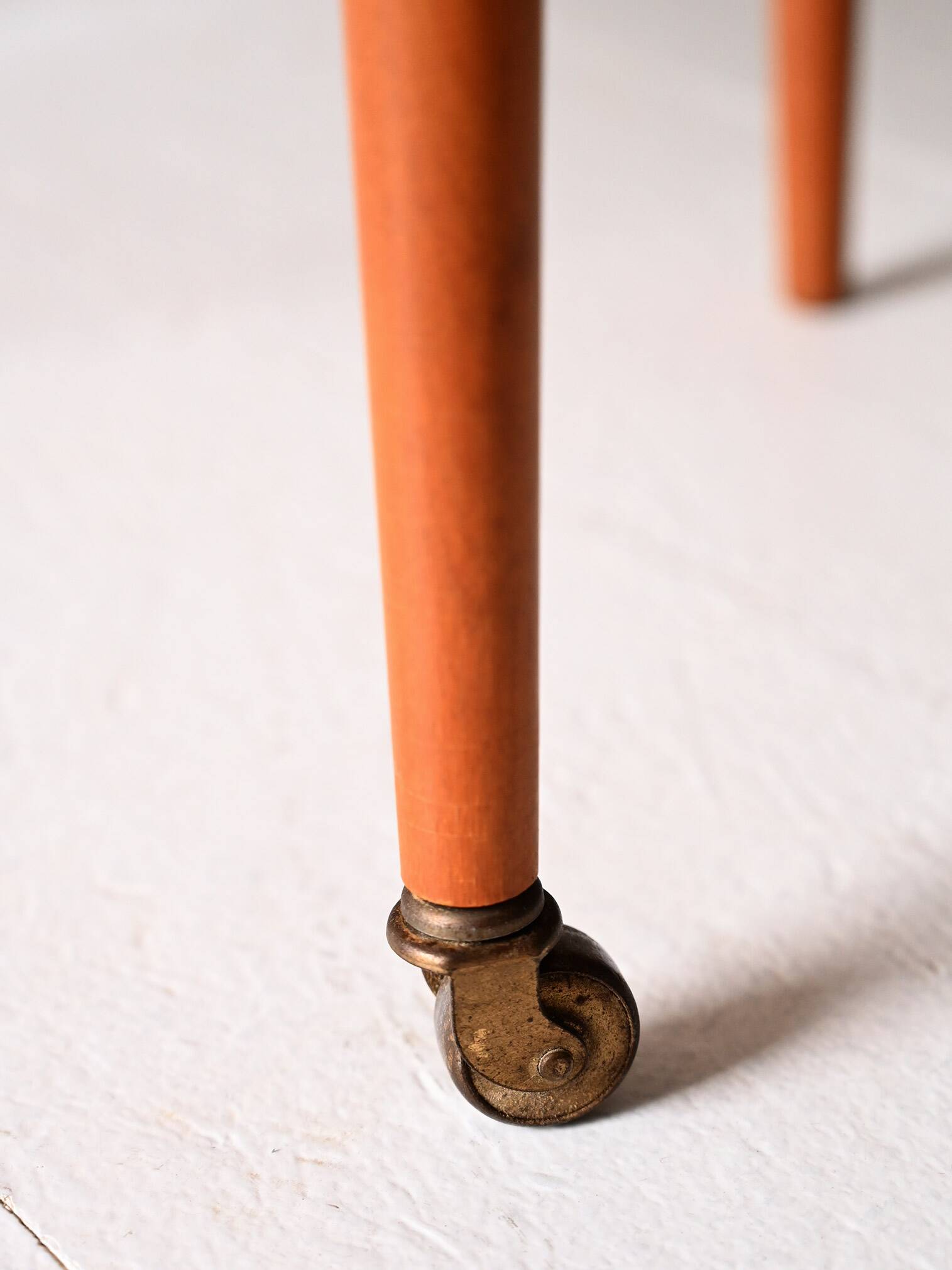 Vintage Scandinavian coffee table in teak with brass shelf