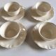 Set of 4 cups breakfasts in faience Sarreguemines ivory to godrons