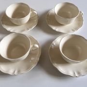 Set of 4 cups breakfasts in faience Sarreguemines ivory to godrons