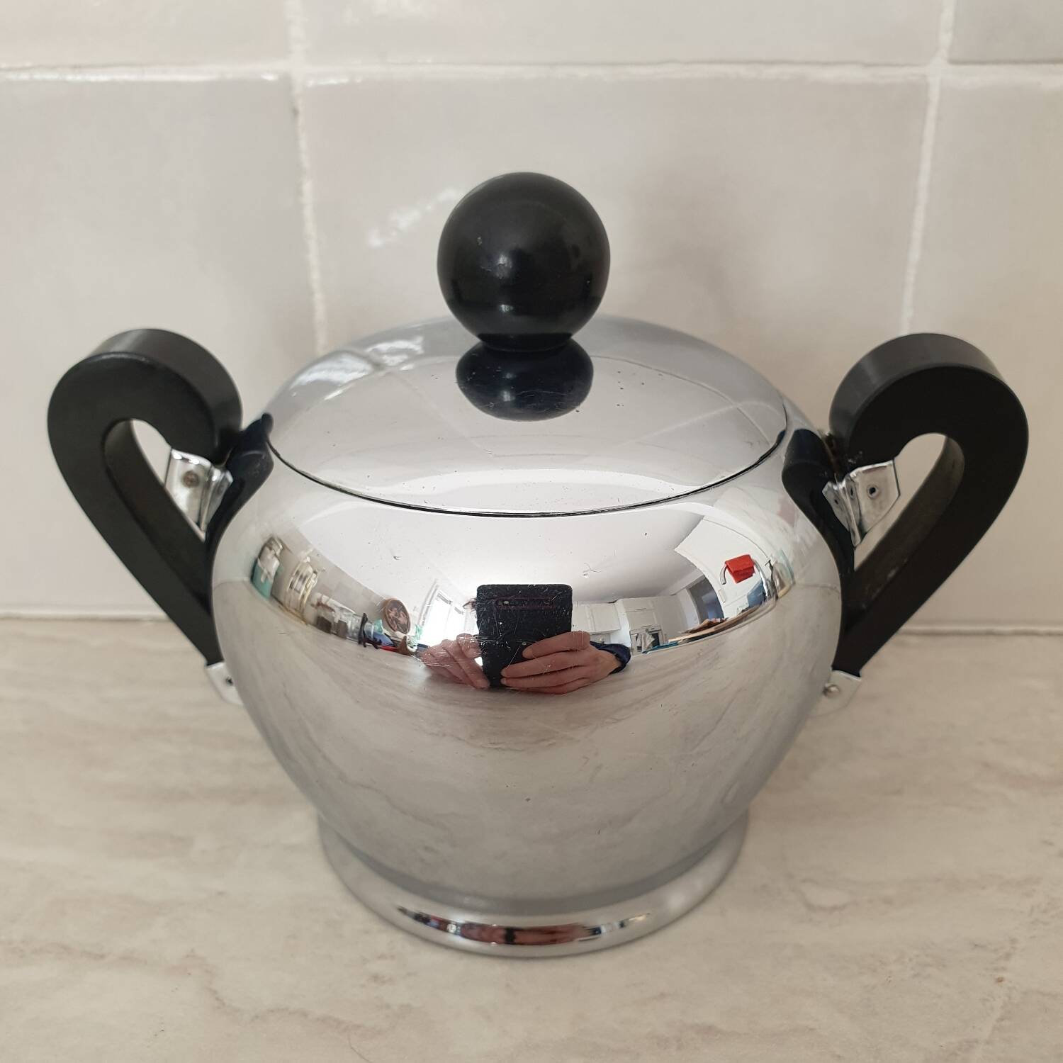 Alessi / Stainless steel and bakelite sugar bowl, "Bombé" collection