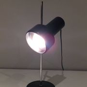 Lampe réglable en métal laqué noir et chrome. Travail français. Vers 1970
