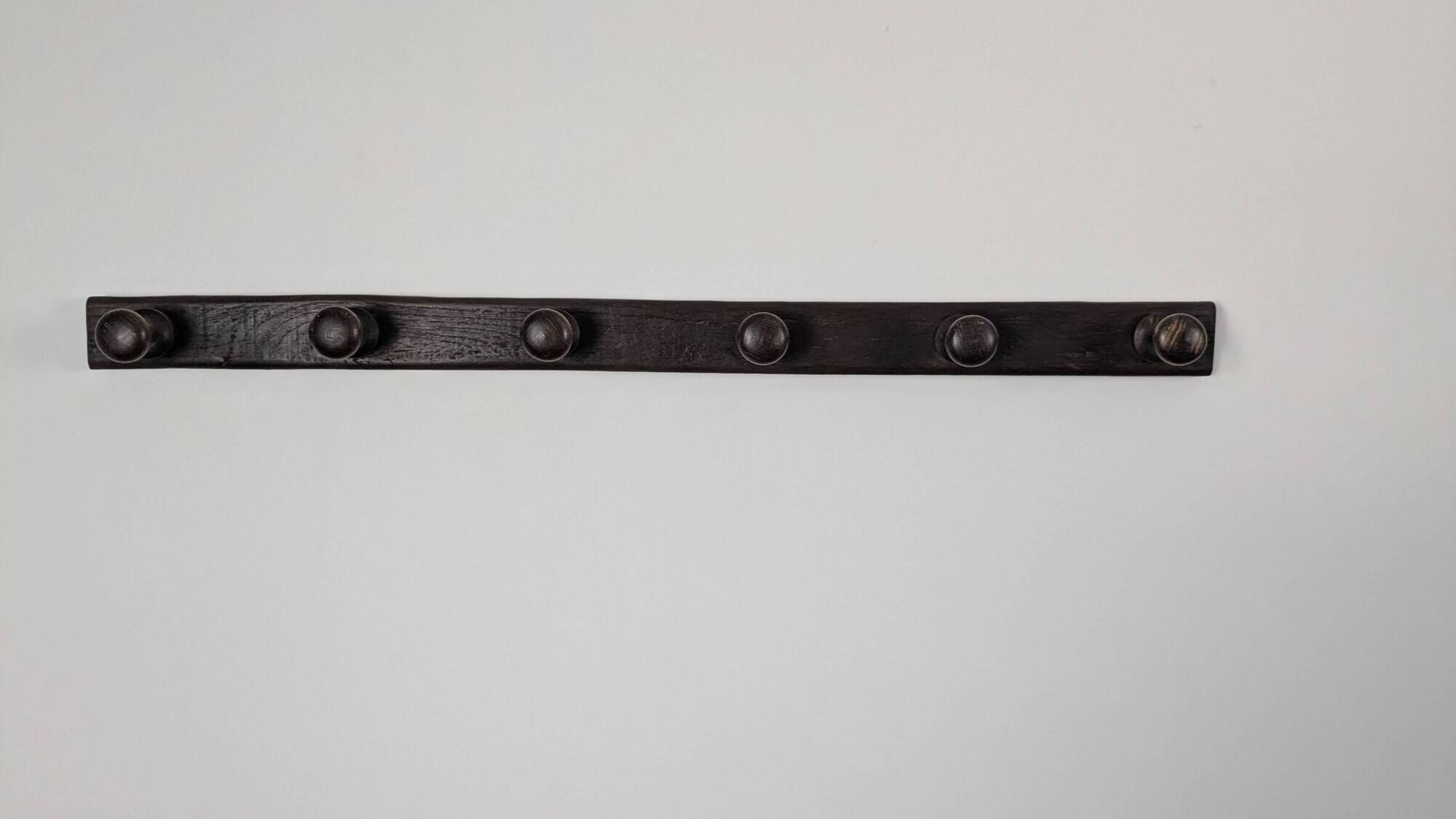 Antique turned wooden coat rack with 6 hooks, rustic spirit.