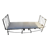 Folding wrought iron bed
