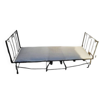 Folding wrought iron bed
