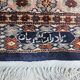 Tapis persan en laine nouée à la main