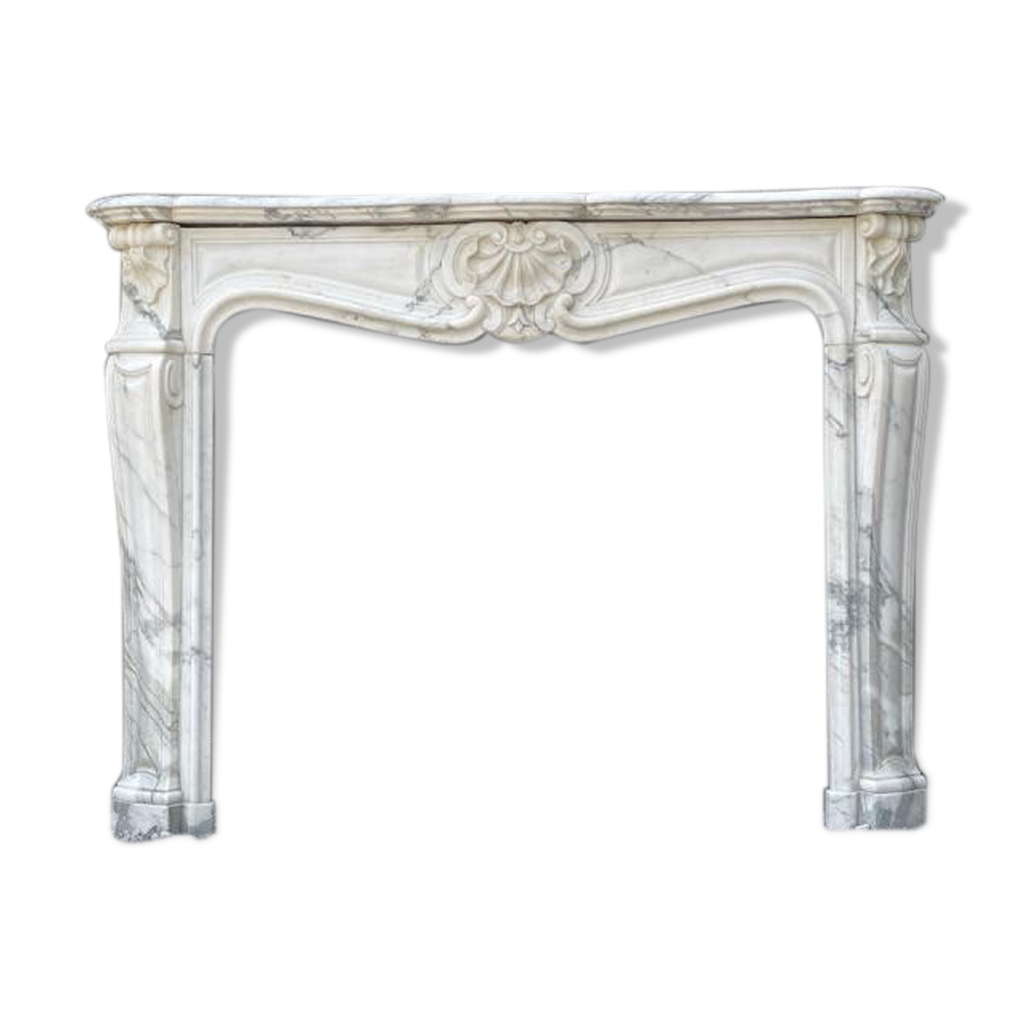 Louis XV style fireplace in white Carrara marble arabescato