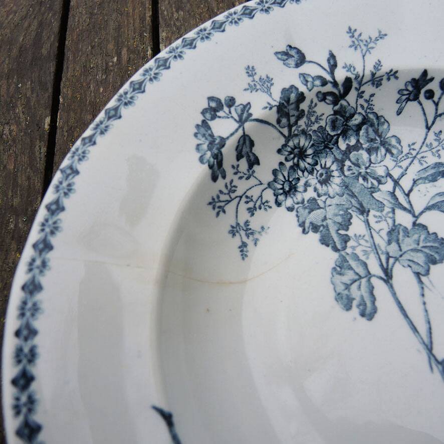 10 old deep plates made of ironstone with floral decoration