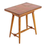 Vintage wooden side table with terracotta top