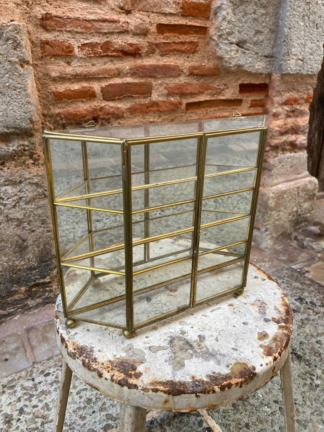 Brass wall display case
