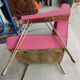 Vintage hairdresser chair feet compass.