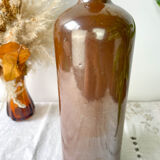 Vintage iridescent brown stoneware bottle