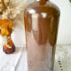Vintage iridescent brown stoneware bottle