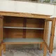 Art Deco sideboard in raw wood with a wax finish, closed by 2 glass doors.