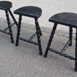 Set of tripod stools with fluted legs