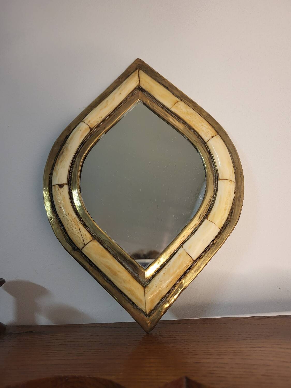 Brass and bone mirror