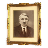 Old photo framed under glass