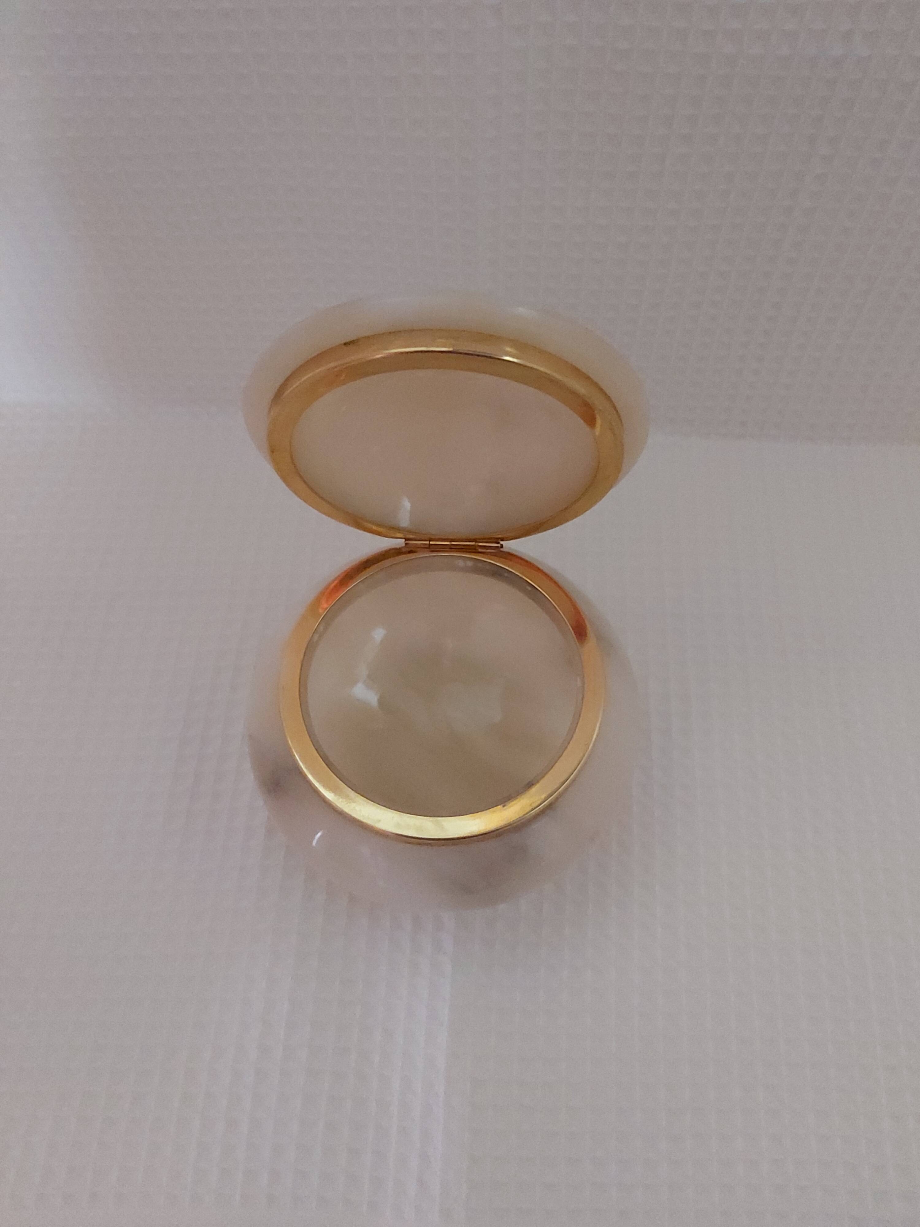 Ivory-colored alabaster box on feet