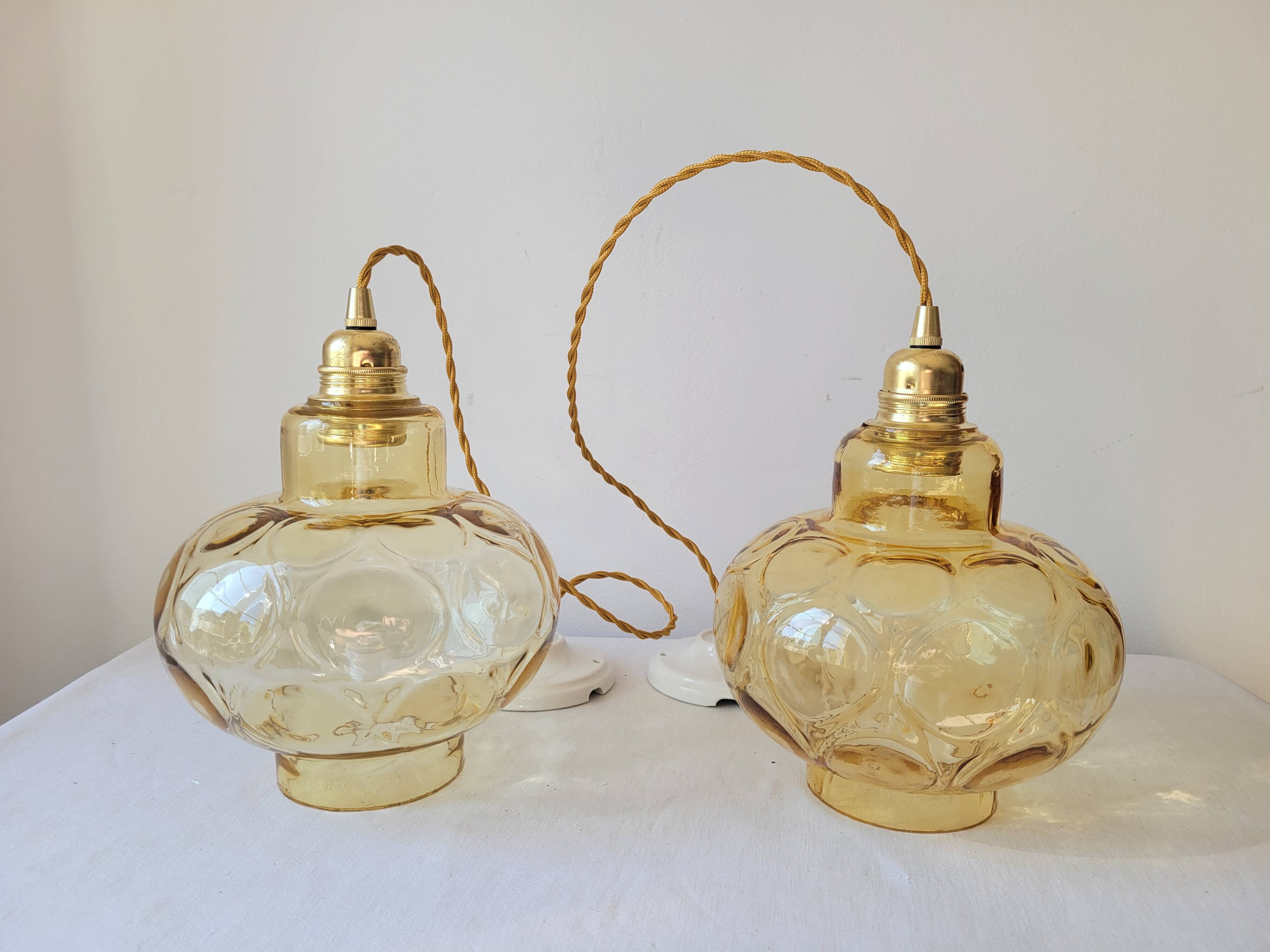 Duo of amber glass pendant lights