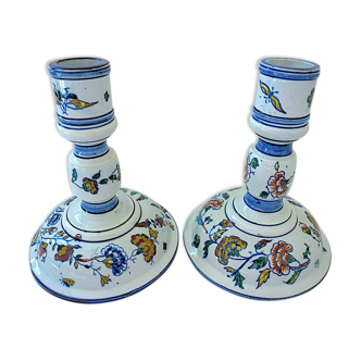 Pair of polychrome earthenware candle holders with floral decoration