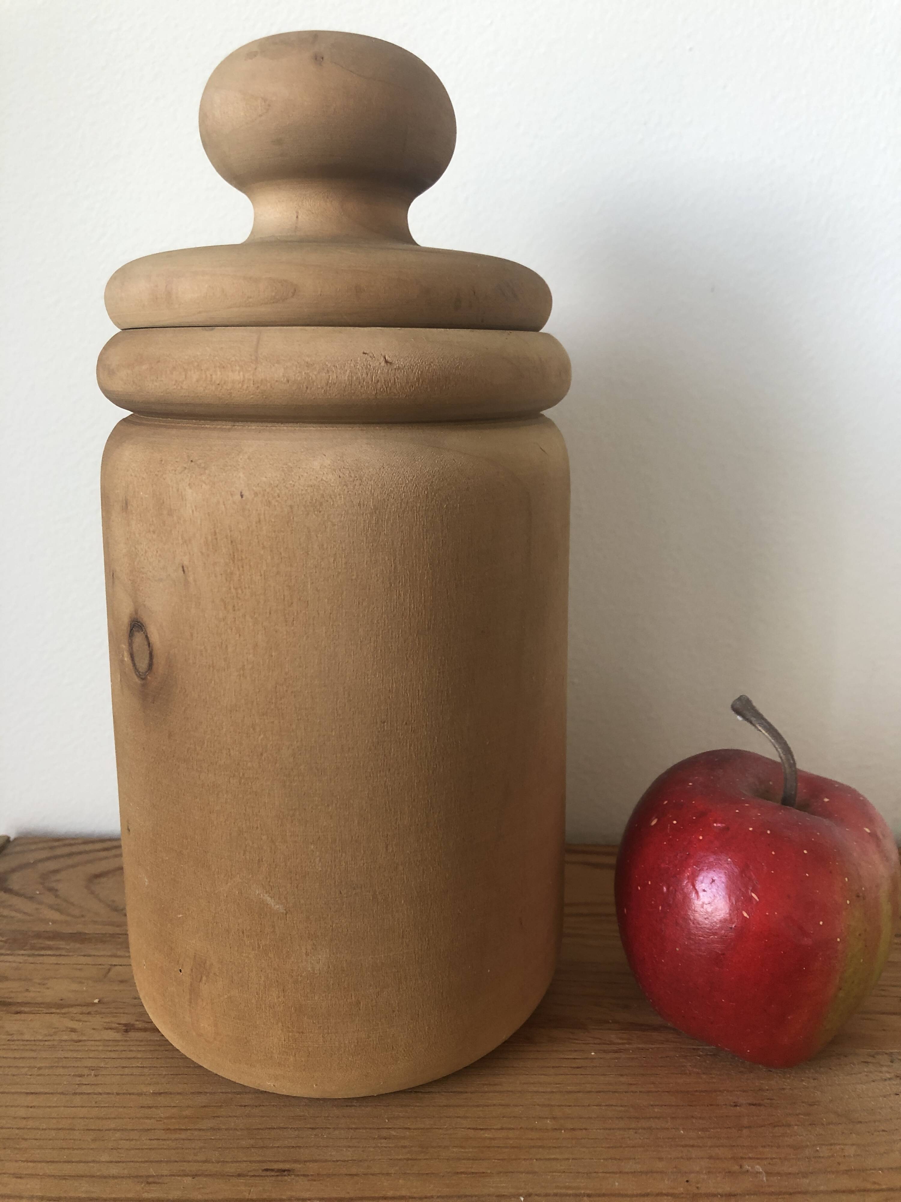 large pot with turned wooden lid