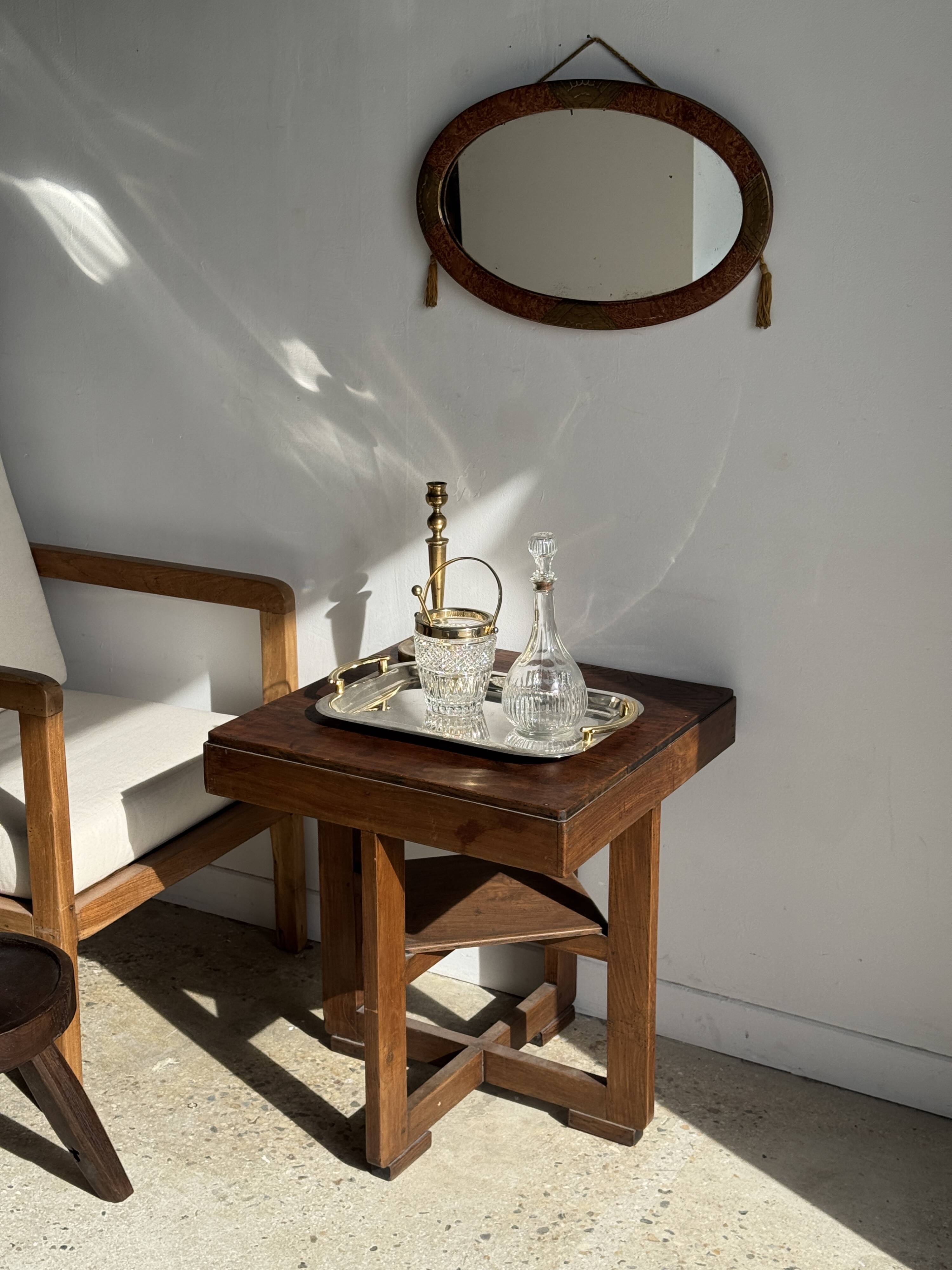 Small oval Art Deco mirror in brown and gold 33x54.