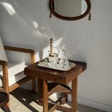 Small oval Art Deco mirror in brown and gold 33x54.