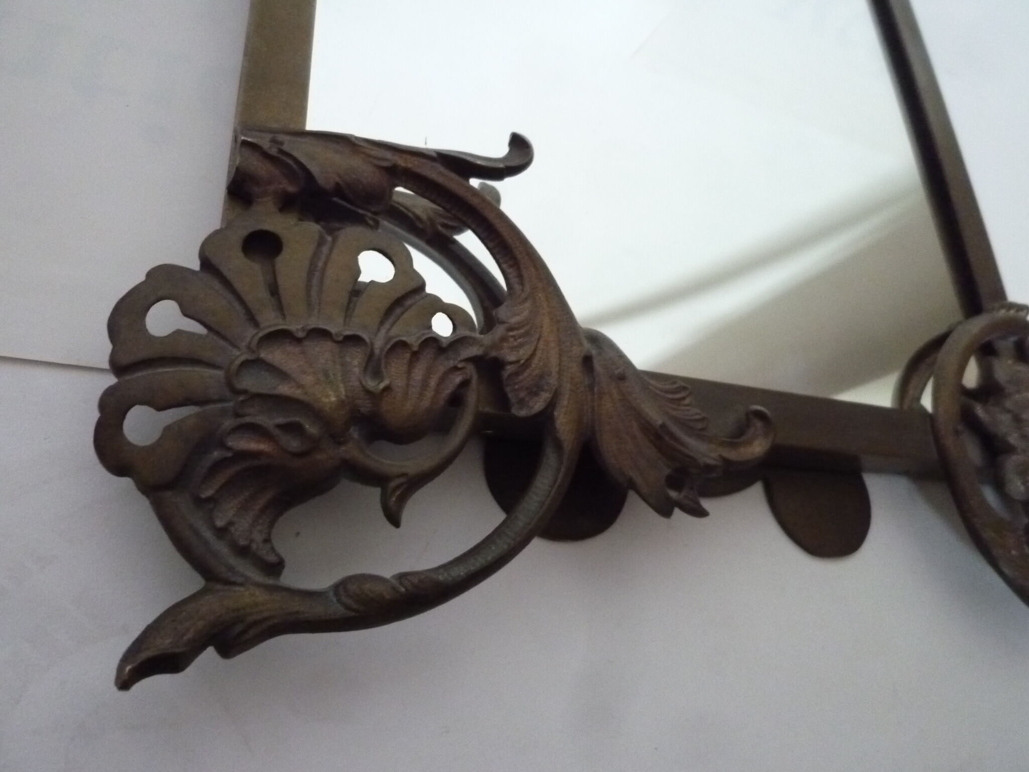 Mirror to ask bronze and brass beginning XXth 32 x 45 cm