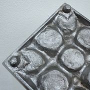 Brutalist style brushed aluminum candle holder