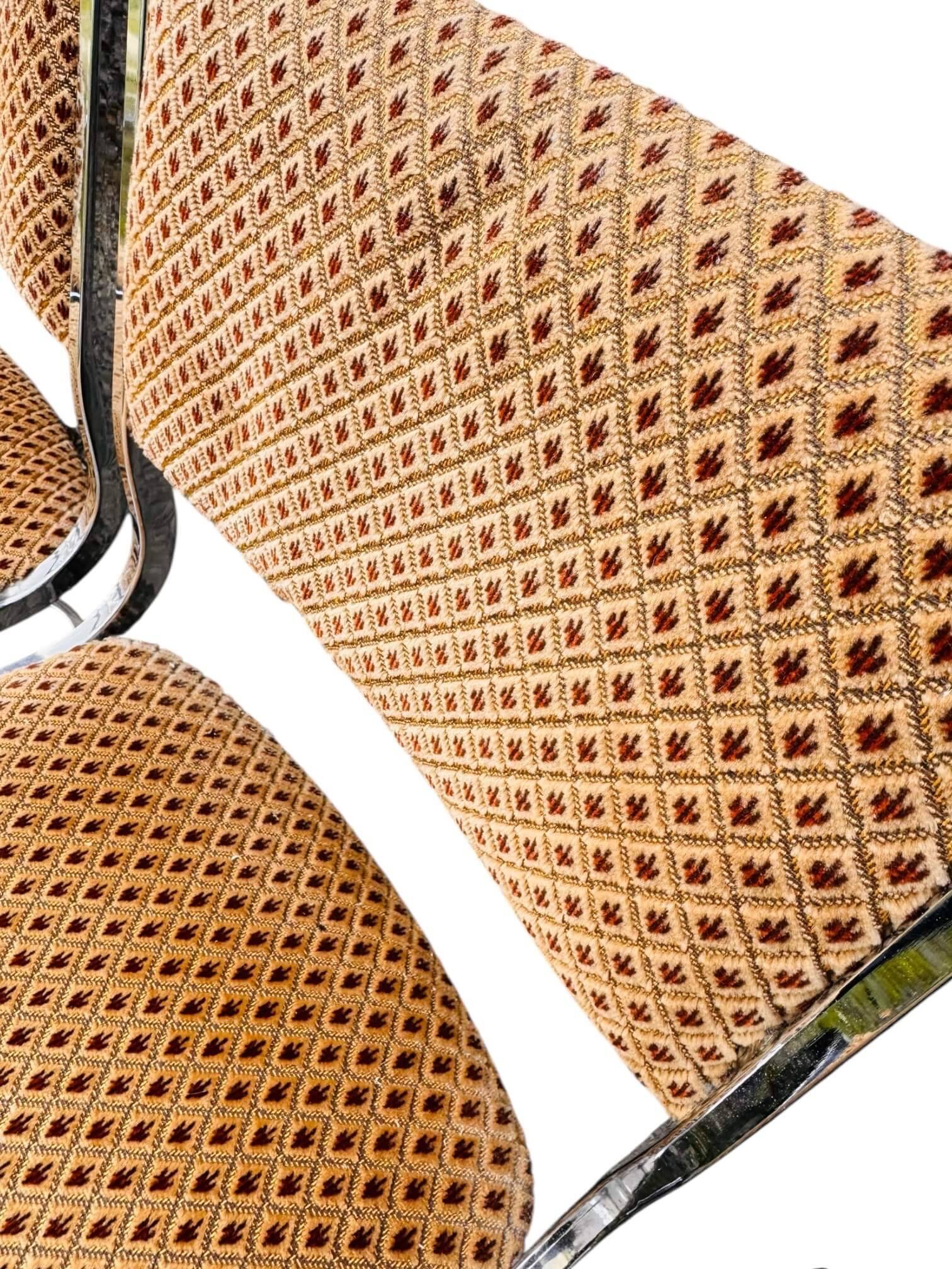 Set of 4 vintage sled chairs from the 1970s