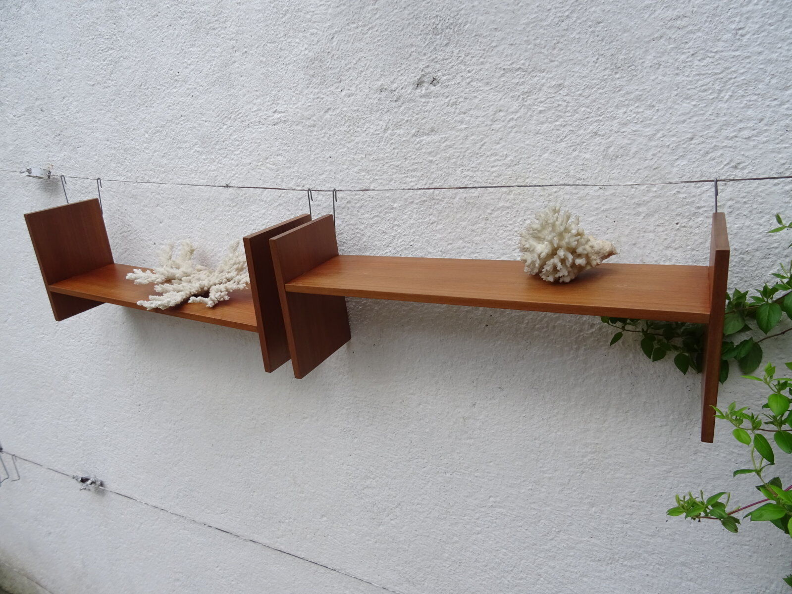 Pair of teak wall shelves