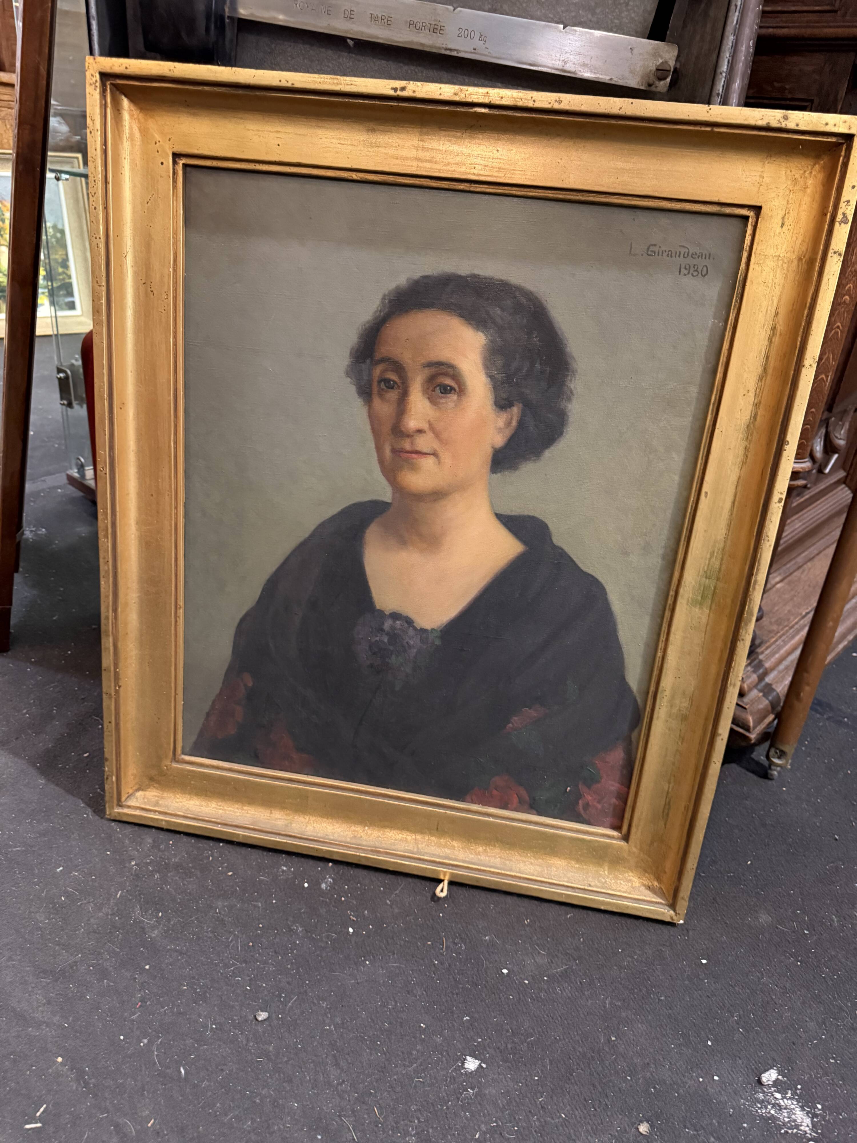Oil on canvas signed Giraudeau 1930 portrait of a woman.