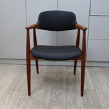 Vintage armchair in teak and black leather model Casina 60s
