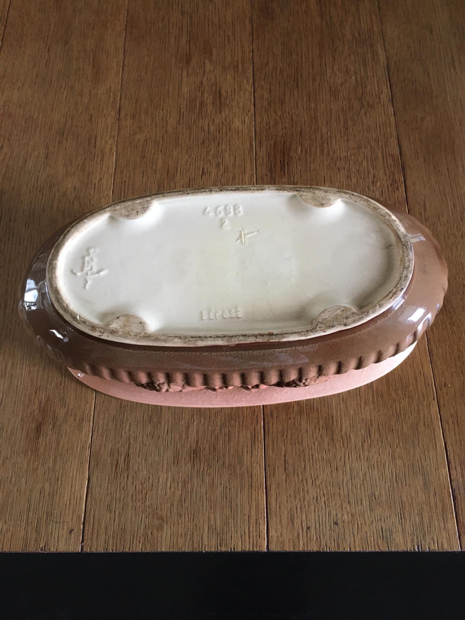 Planter in earthenware stamped de bruyn in pink tones