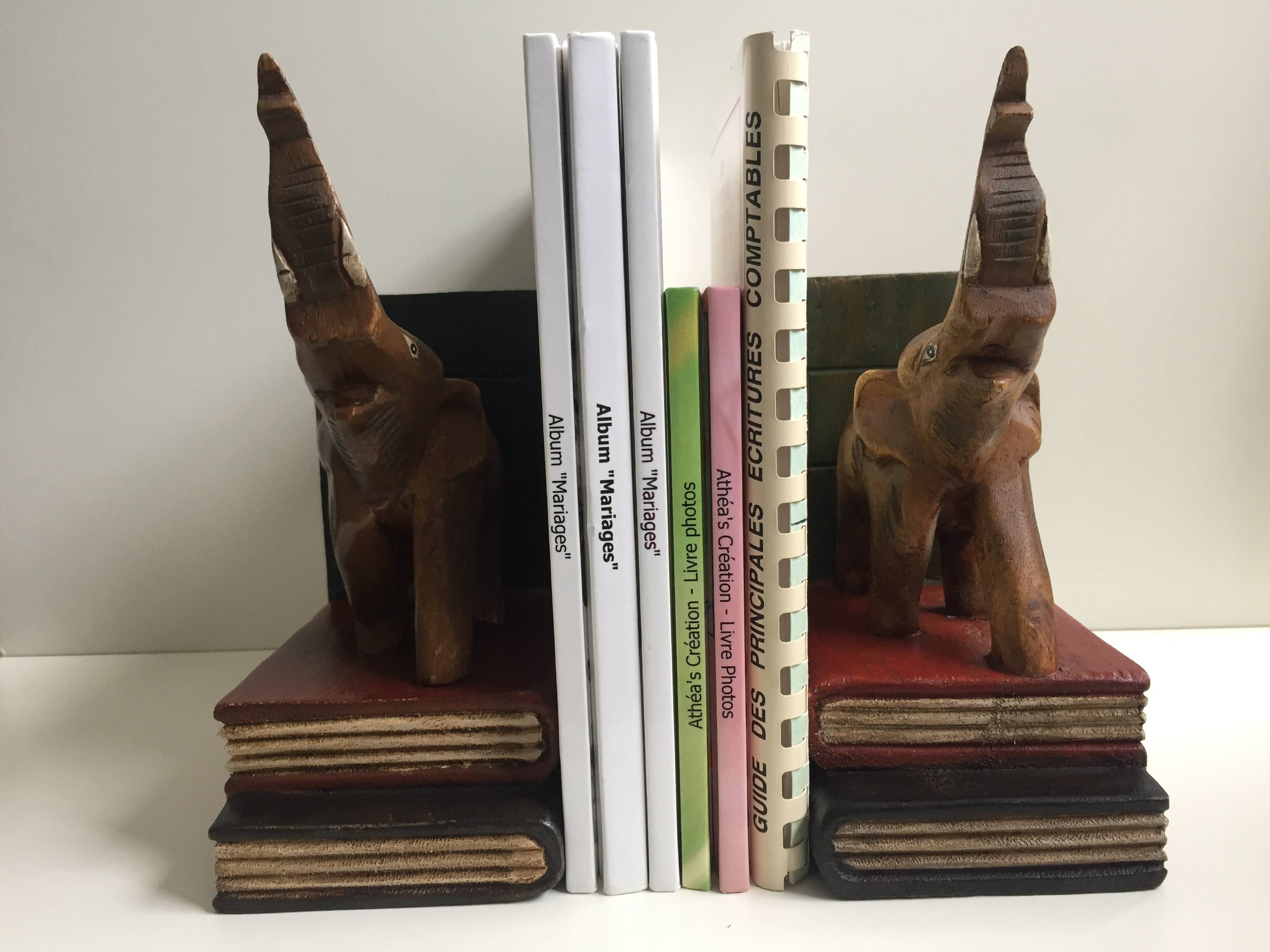 Pair of vintage carved wooden elephant bookends