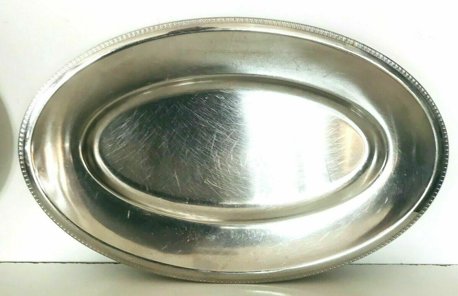 Lot of four dishes and two silver metal steels Maison Royal BB France