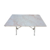 White bistro table in marble and cast iron