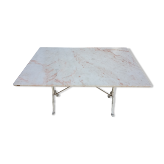 White bistro table in marble and cast iron