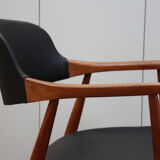 Vintage armchair in teak and black leather model Casina 60s