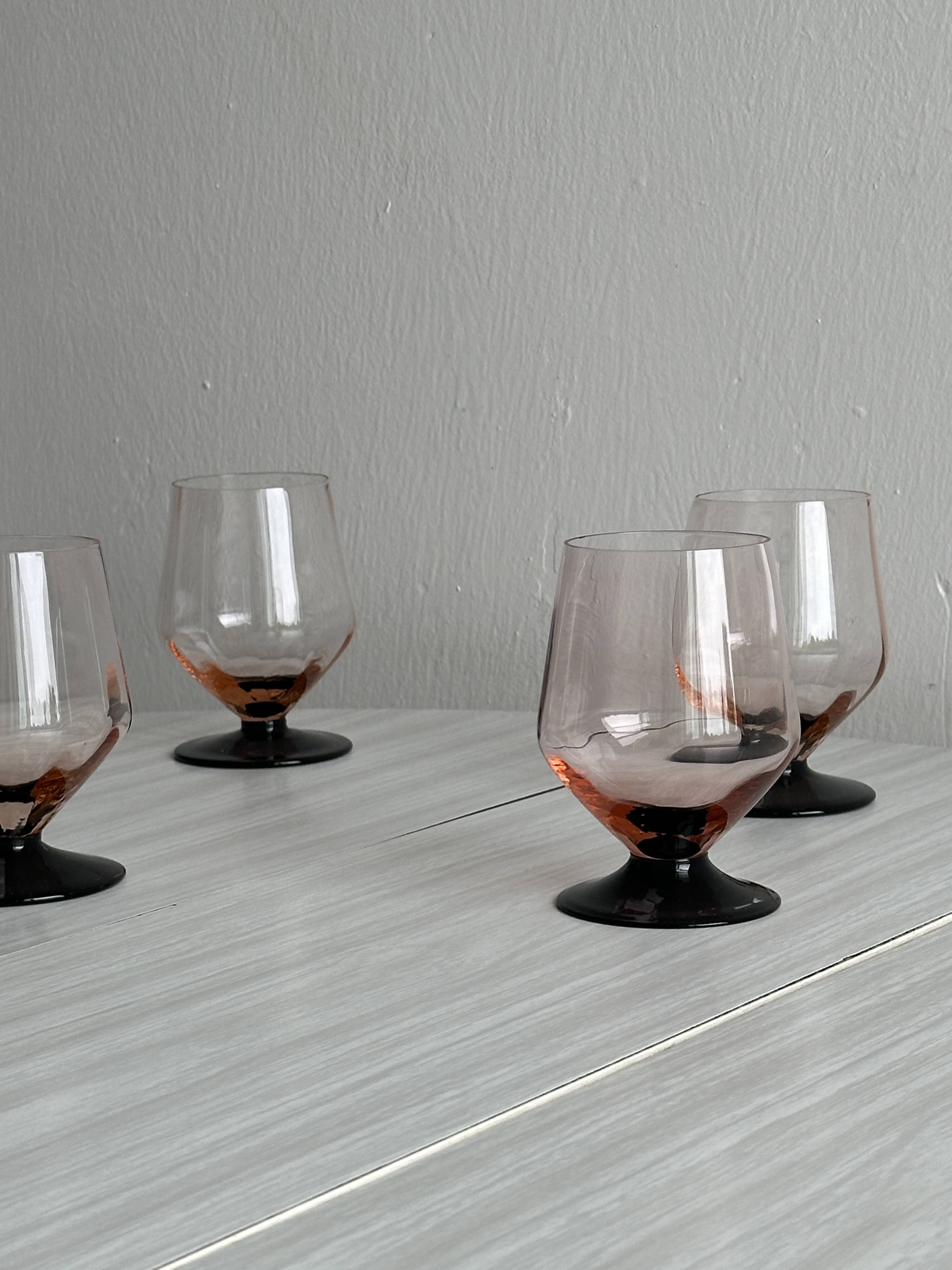 6 vintage translucent pink glasses with black stems