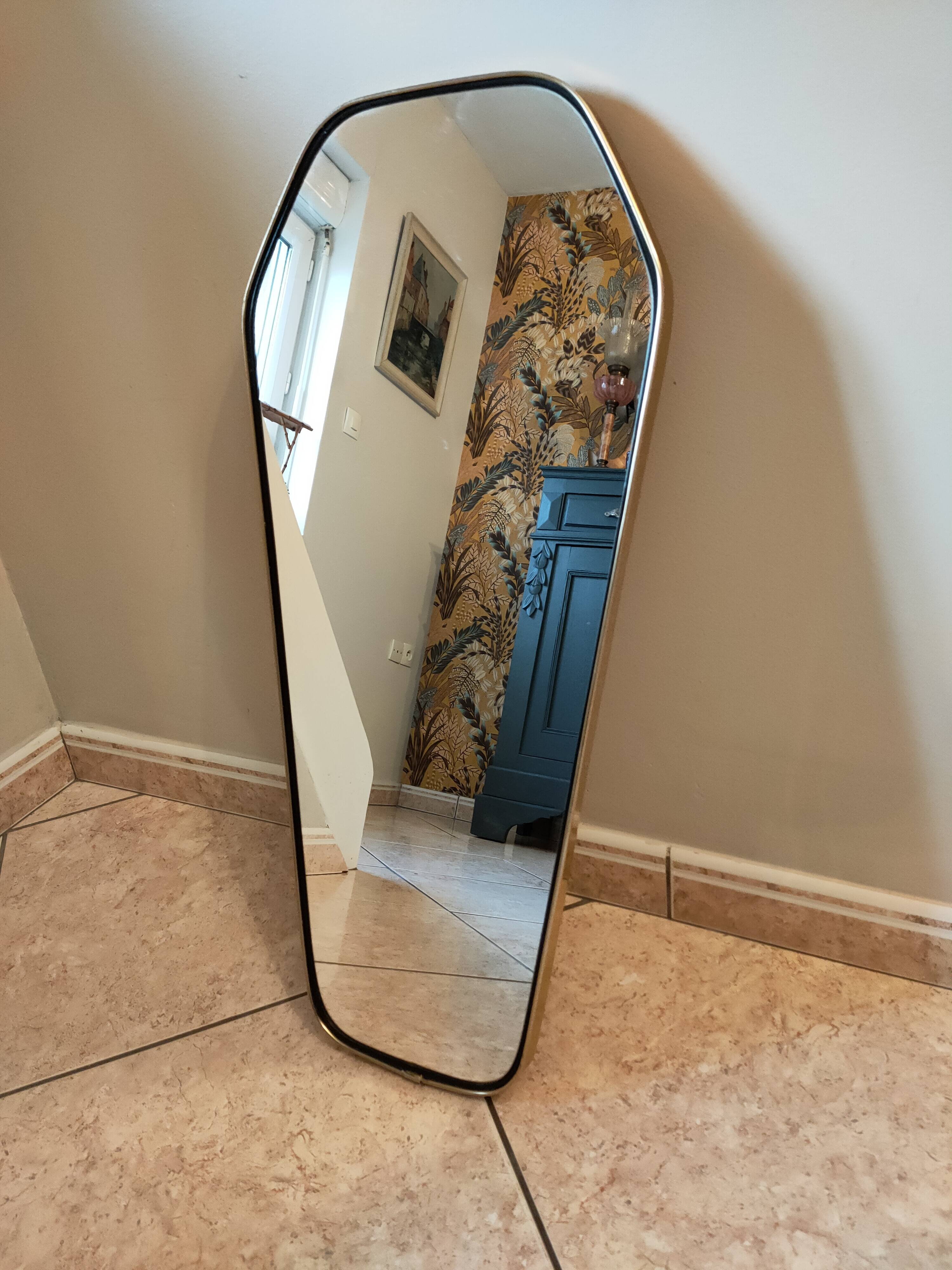 Free-form mirror from the 50s-60s