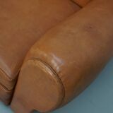 Pair of French club chairs with moustache back in cognac leather, 1950s