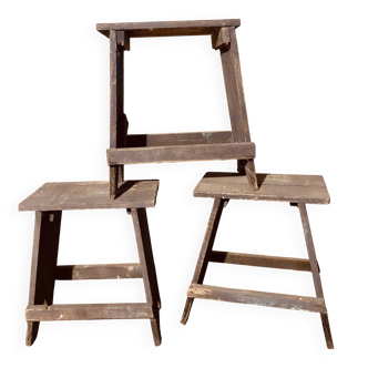 3 low blue-grey stools
