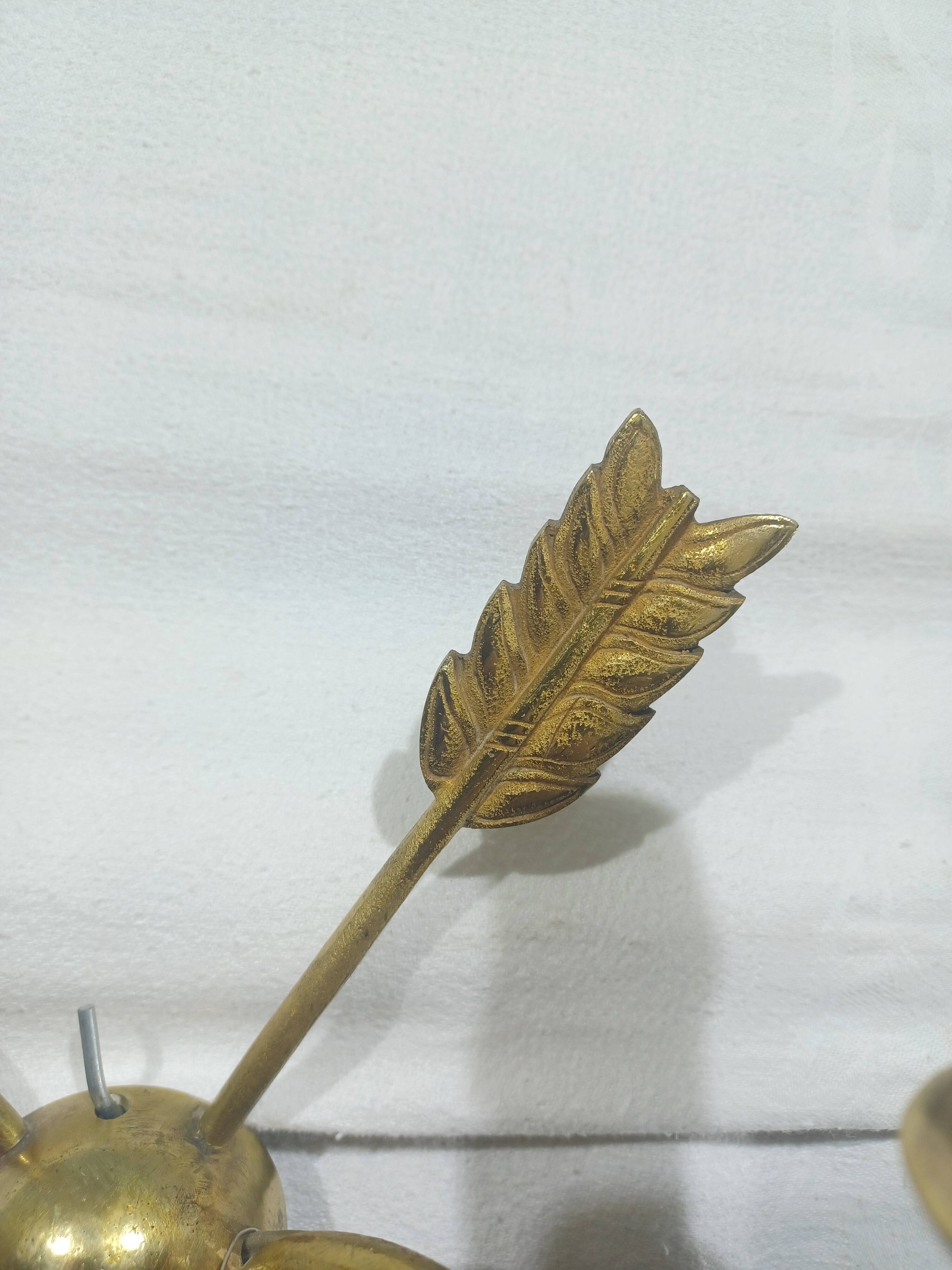 Empire style arrow wall light