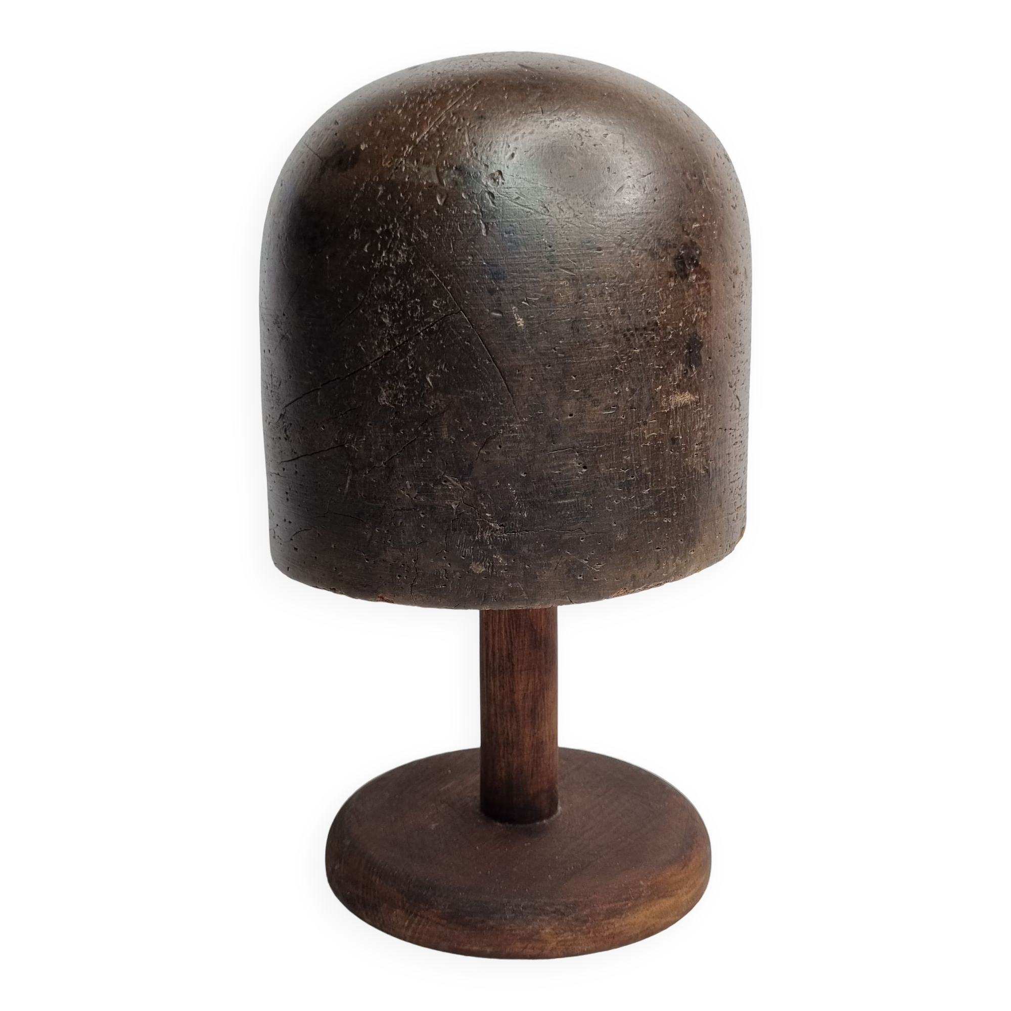Old solid wood hat shape on foot, 1900