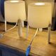 Pair of white Ikea Tvärs bedside lamps